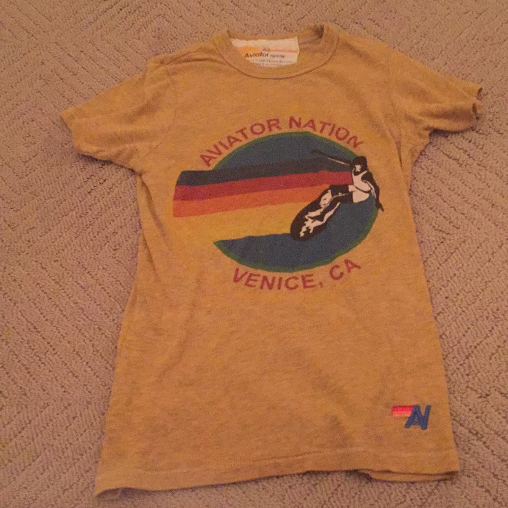 Brownish yellow aviator nation top